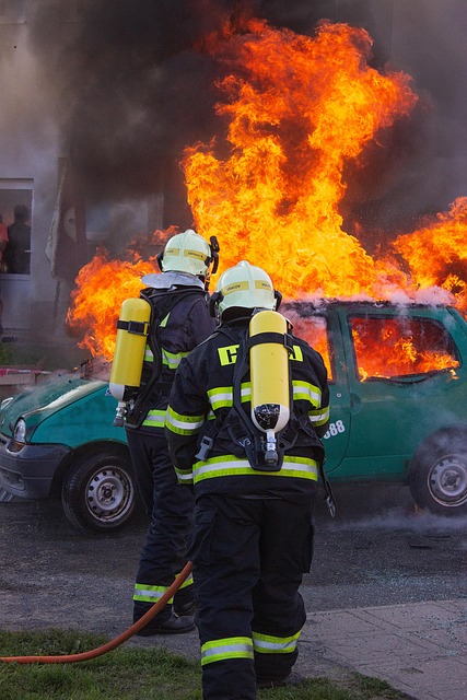 Vehicle on fire with fire fighters to illustrate how I thought my caravan manoeuvring course might turn out! 