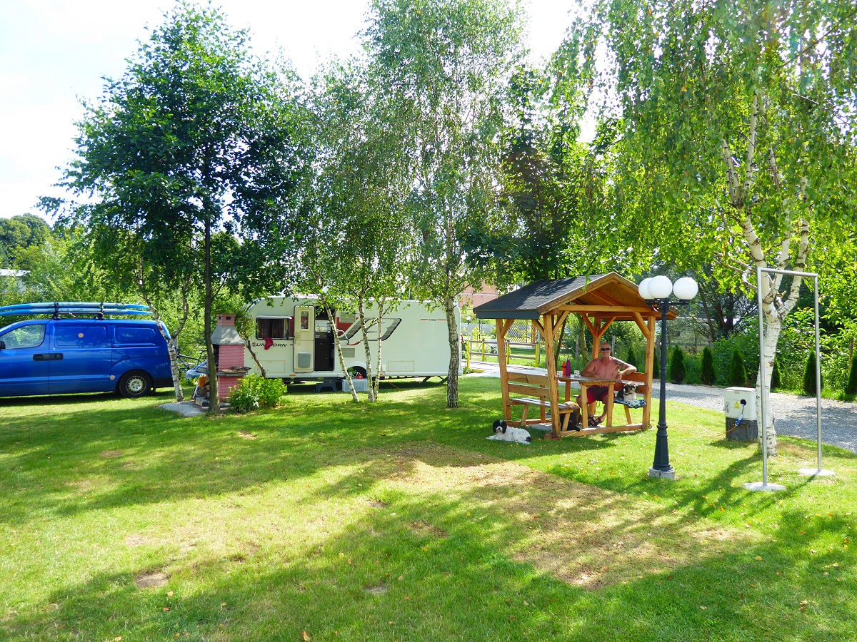 Caravan in pleasant green campsite