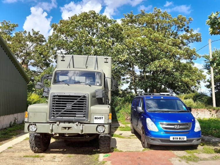 Jacqueline Lambert's truck, The Beast, next to her van, Big Blue