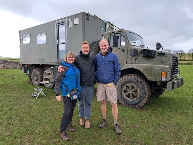 Jacqueline and Mark Lambert with TV Presenter Ben Fogle in front of their truck, The Beast