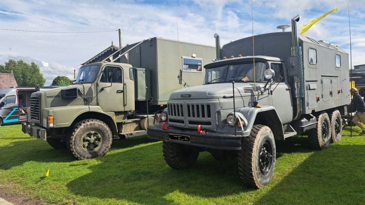 A volvo N10 and Zil overland truck conversion adjacent to each other