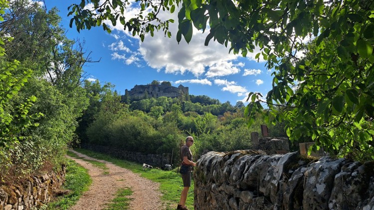 An evening walk up to the castle at Sévérac-le-Château or Sévérac d’Aveyron viewed from the foot of the hill at sunset