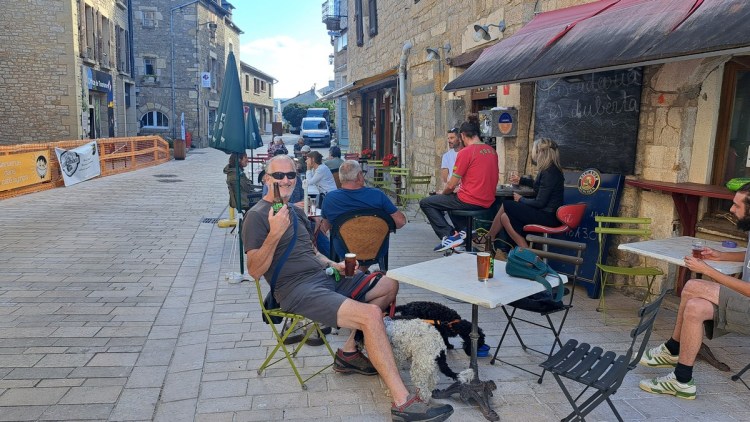 Mark enjoying a beer at a pavement cafe in Sévérac-le-Château