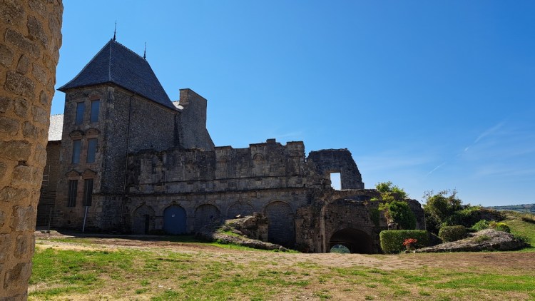 To the right of shot, the remains of a grand horseshoe staircase at Sévérac-le-Château similar to the one at the Château de Fontainebleau