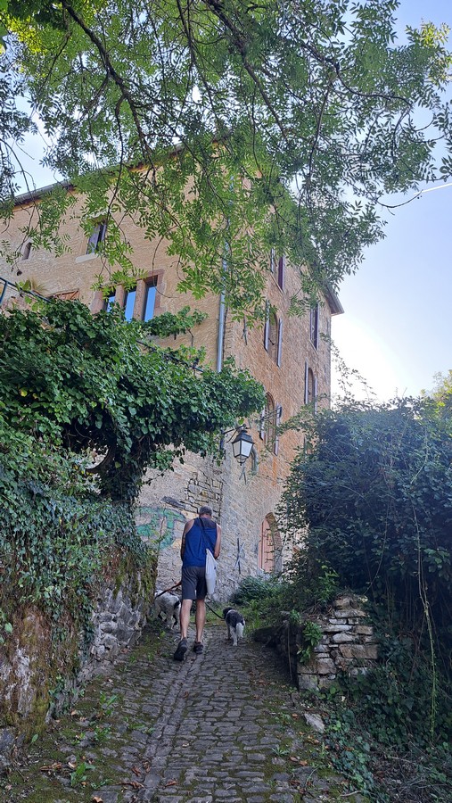 Mark ascending a cobbled alley, Cordes-sur-Ciel