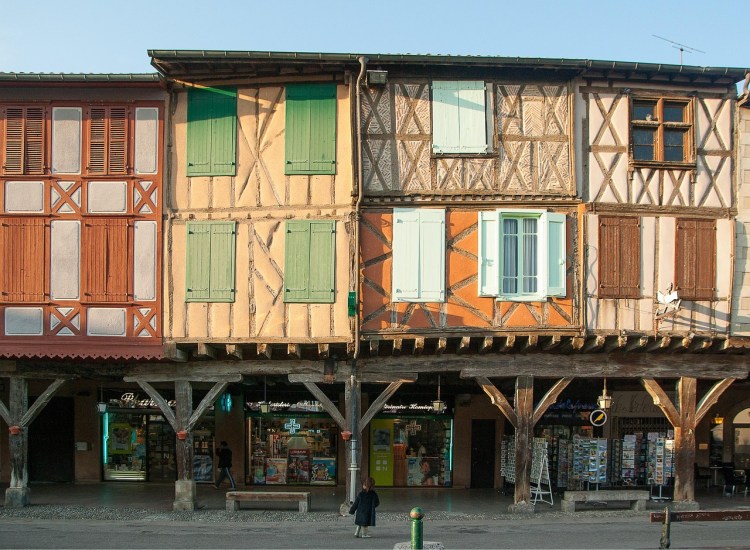 The gallieried timber framed buildings surrounding the market square in the bastide town of Mirepoix